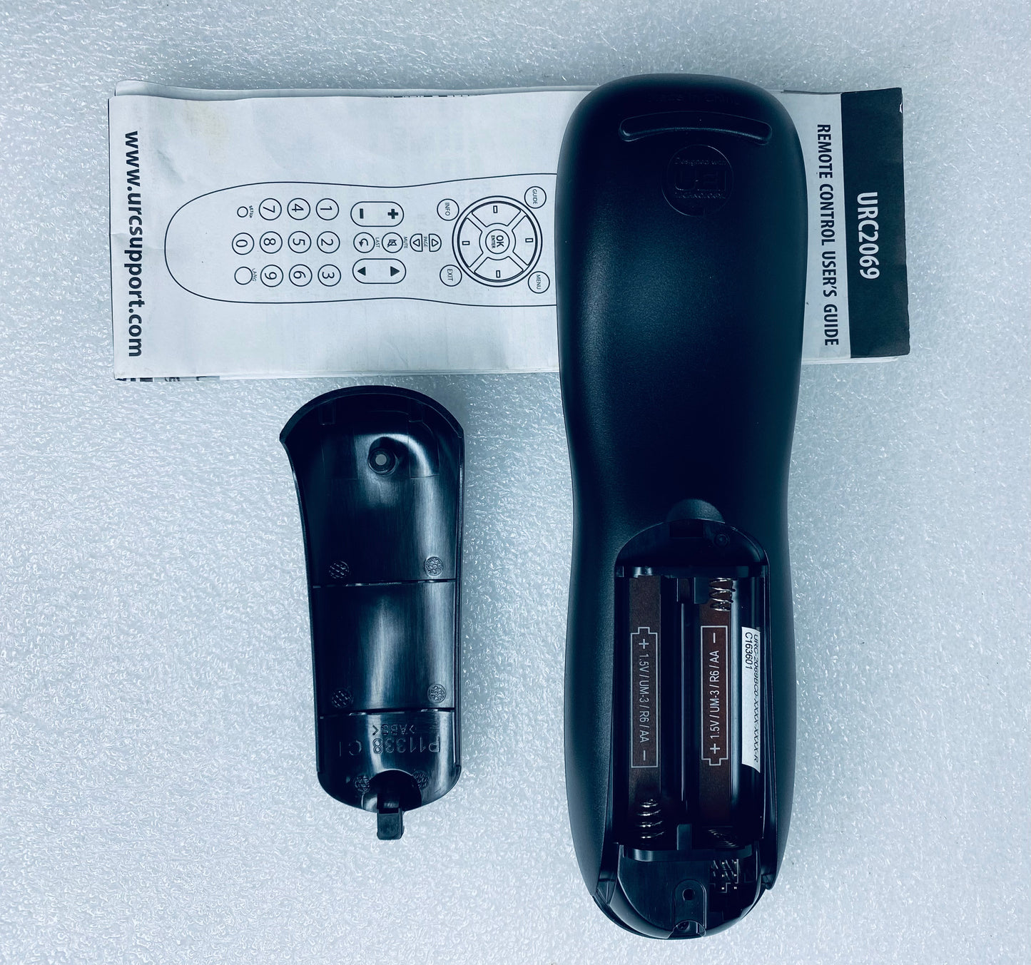 #04 - universal Electronics Programmable Remote Control, URC2069, 7" x 2" x 1", Black - (IN CONDITION AS SHOWN)