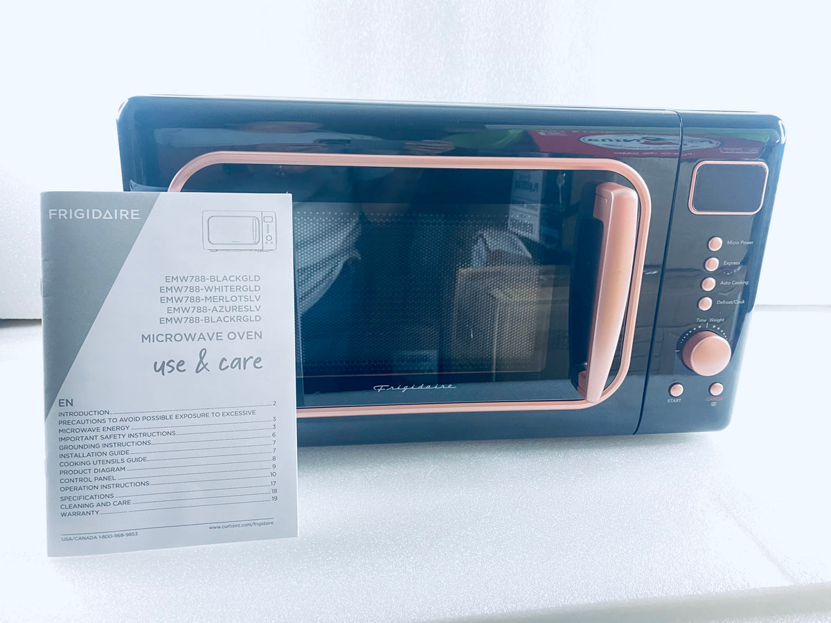 New Open Box Frigidaire Retro Microwave 0.7 Cu. Ft. Compact 700W - Black Pink