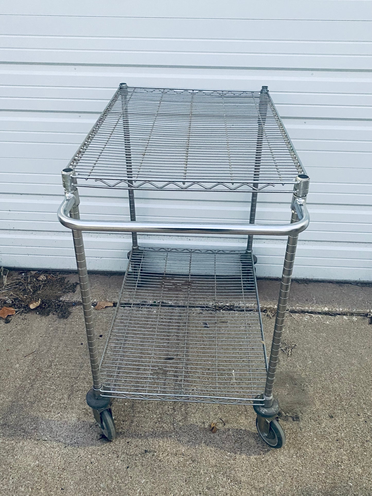 #136 - Stainless Steel Push Cart 2 Tier Adjustable With Casters & Approx. Dimensions: 40” x 41” x 24” - (IN CONDITION AS SHOWN) - (READ)