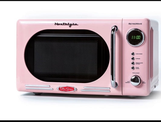 Like New Nostalgia 7 Cu. Ft. Retro Compact Countertop Microwave Oven, Pink