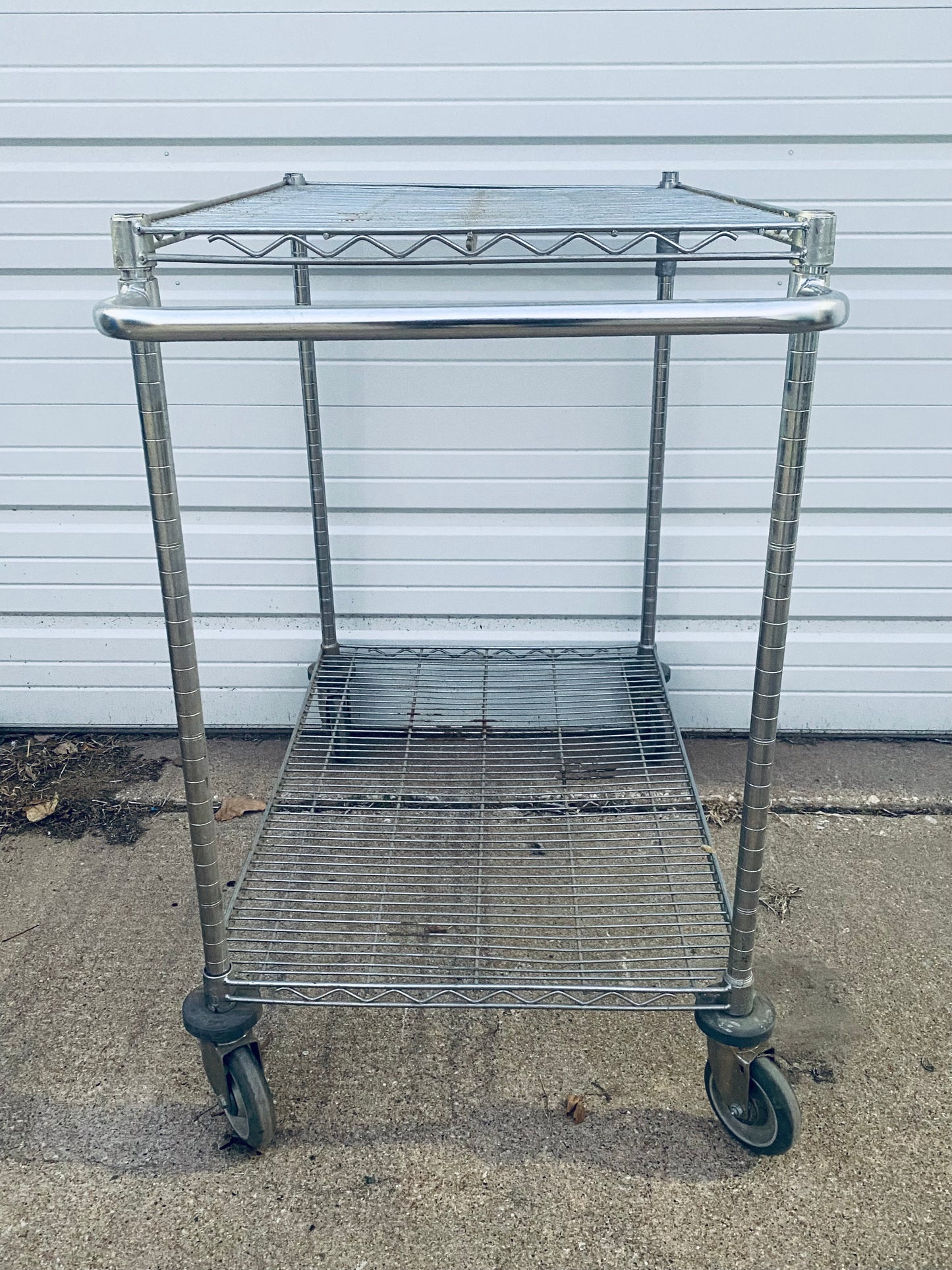 #136 - Stainless Steel Push Cart 2 Tier Adjustable With Casters & Approx. Dimensions: 40” x 41” x 24” - (IN CONDITION AS SHOWN) - (READ)