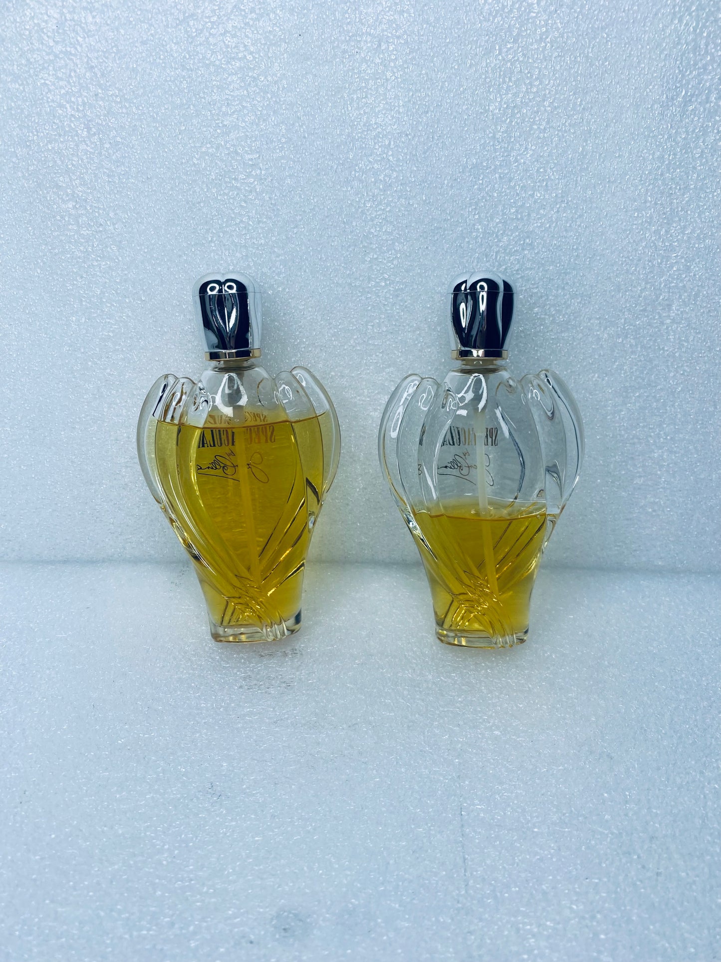 #238 - Lot Of 2 - Spectacular Perfume By Joan Collins - (IN CONDITION AS SHOWN)