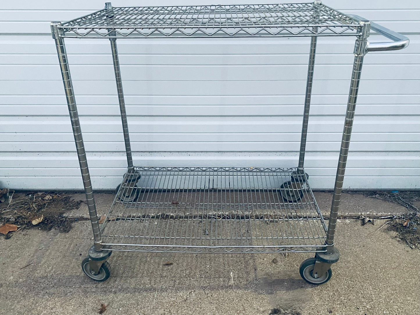 #136 - Stainless Steel Push Cart 2 Tier Adjustable With Casters & Approx. Dimensions: 40” x 41” x 24” - (IN CONDITION AS SHOWN) - (READ)