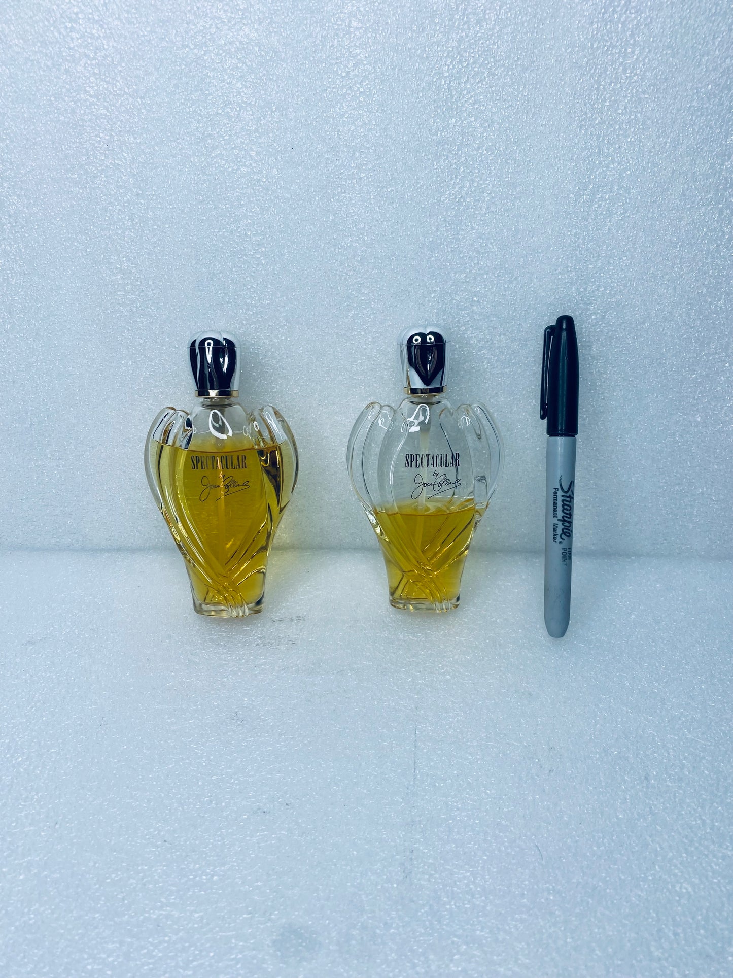 #238 - Lot Of 2 - Spectacular Perfume By Joan Collins - (IN CONDITION AS SHOWN)