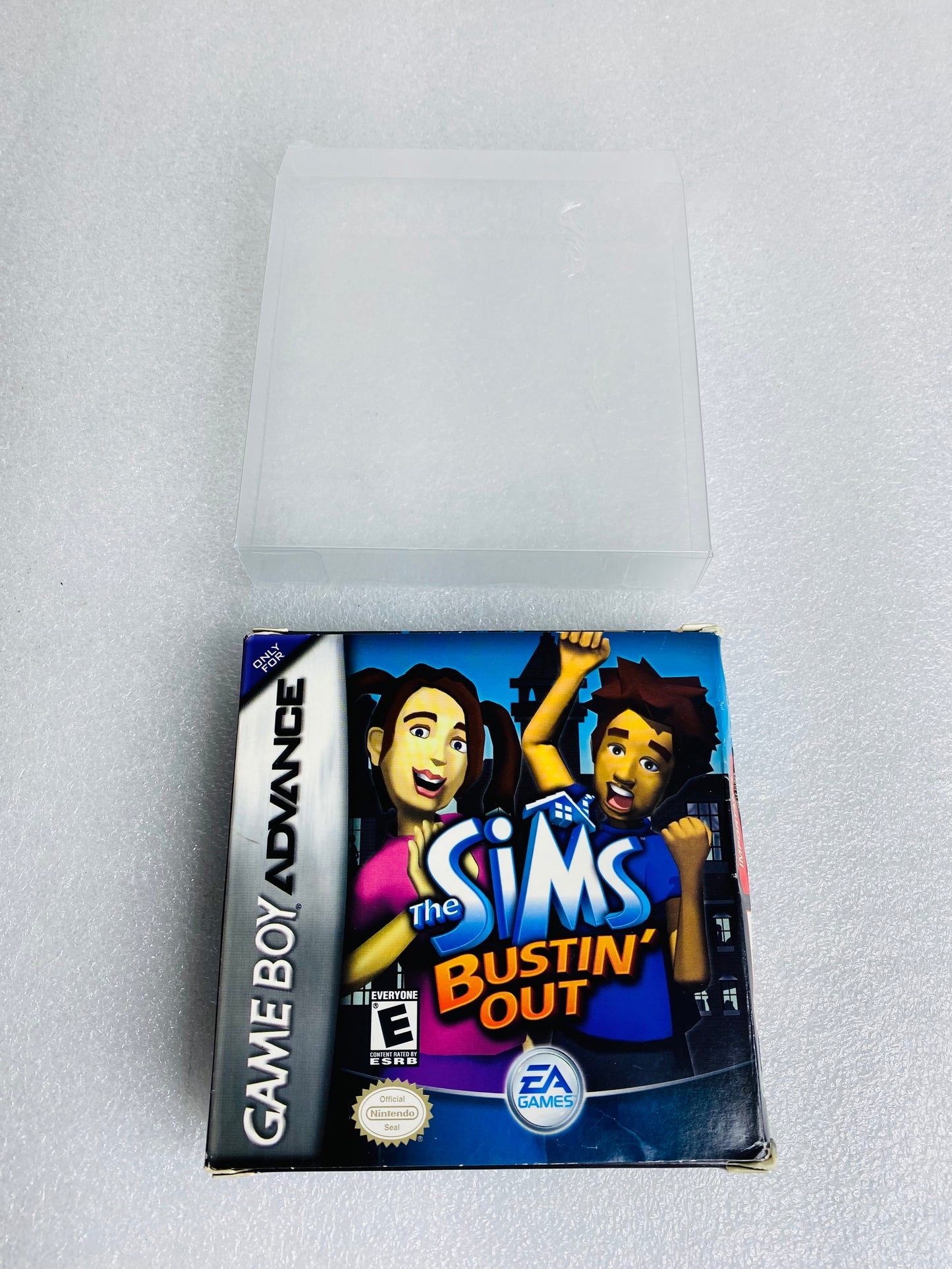 the Sims Bustin' Out (Nintendo Game Boy Advance, 2003) W/Plastic Cover - (READ)