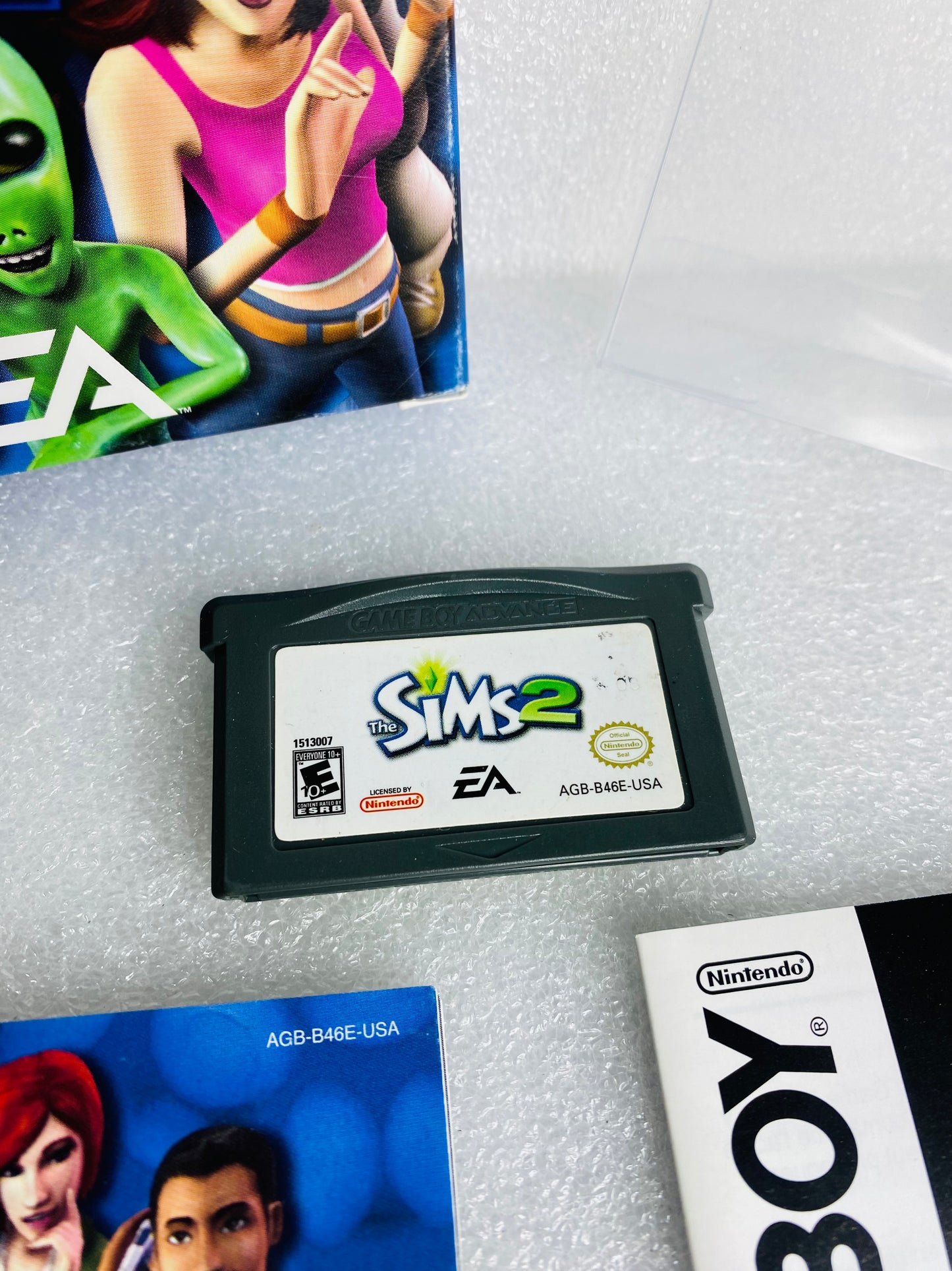 the Sims 2 (Nintendo Game Boy Advance, 2005) W/Plastic Cover - (READ)