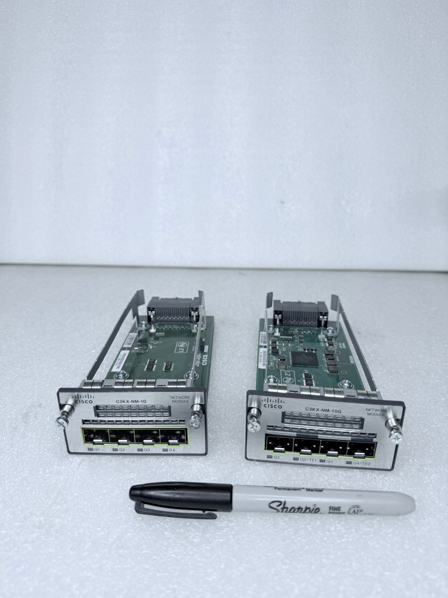 #162 - lot Of 2 - Cisco C3KX-NM-10G Network Modules, 8" x 3" x 2" - (READ) $$