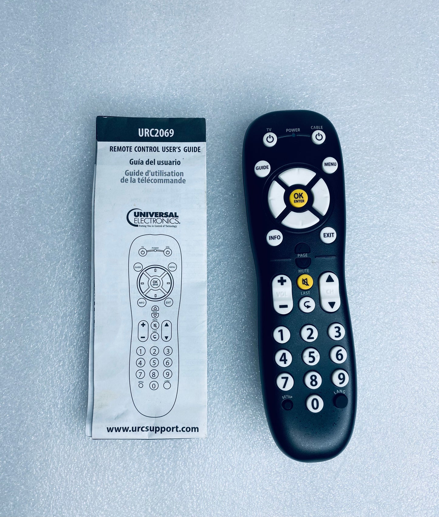 #04 - universal Electronics Programmable Remote Control, URC2069, 7" x 2" x 1", Black - (IN CONDITION AS SHOWN)