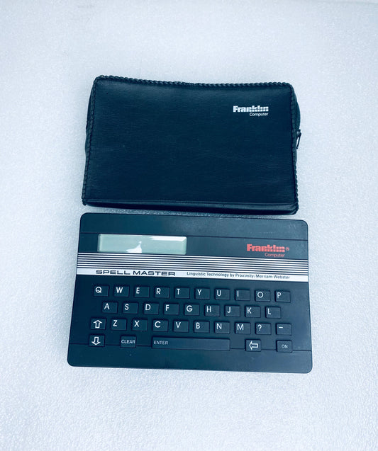 #25 - franklin Computer Spell Master Linguistic Technology Black SA-103 - (READ) - (IN CONDITION AS SHOWN)