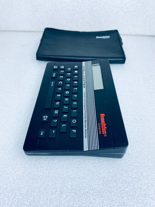 #25 - franklin Computer Spell Master Linguistic Technology Black SA-103 - (READ) - (IN CONDITION AS SHOWN)