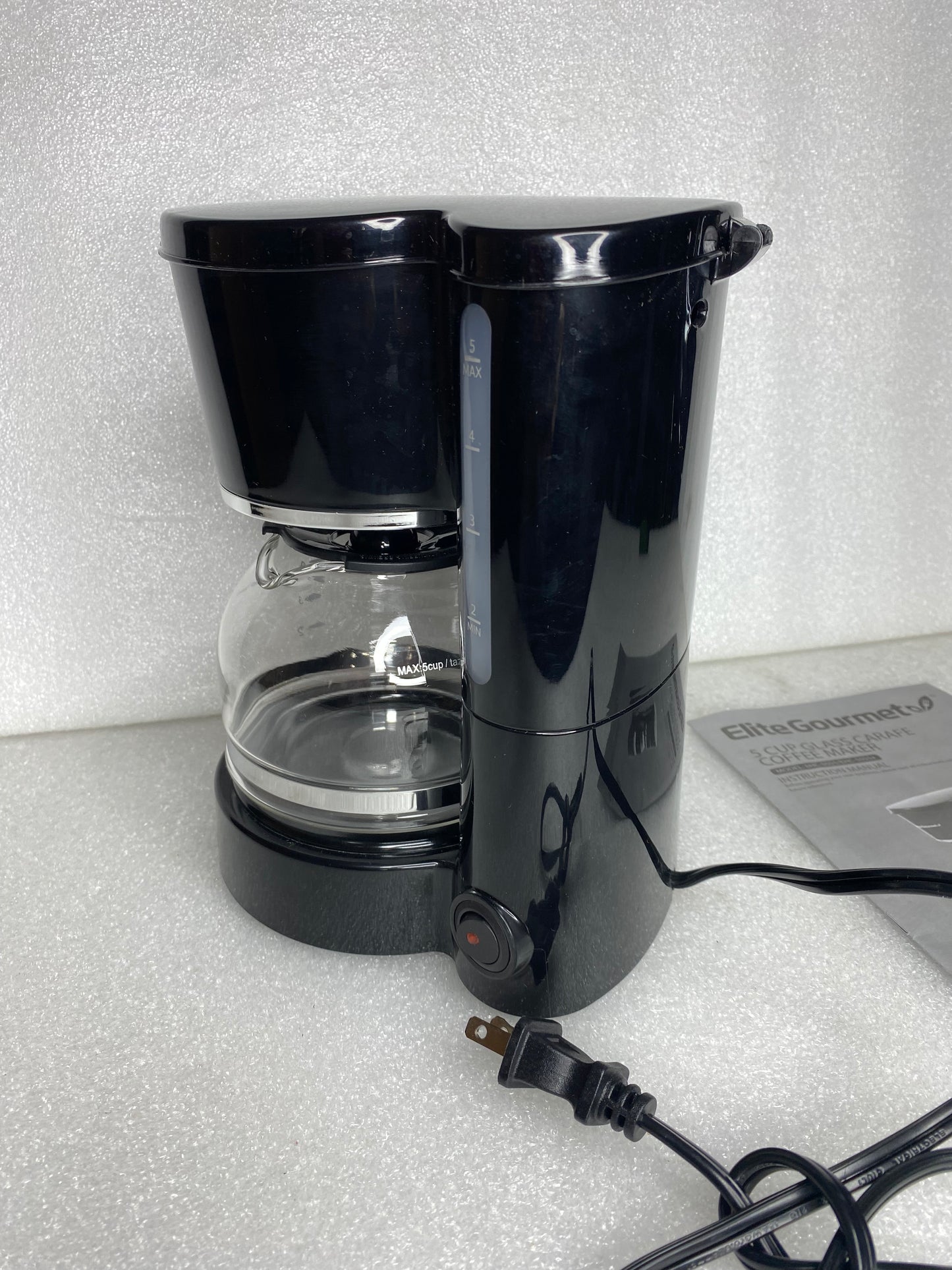#50 - Elite Gourmet 5 Cup Glass Carafe Coffee Maker, EHC-5055, Black - (READ) - (IN CONDITION AS SHOWN)