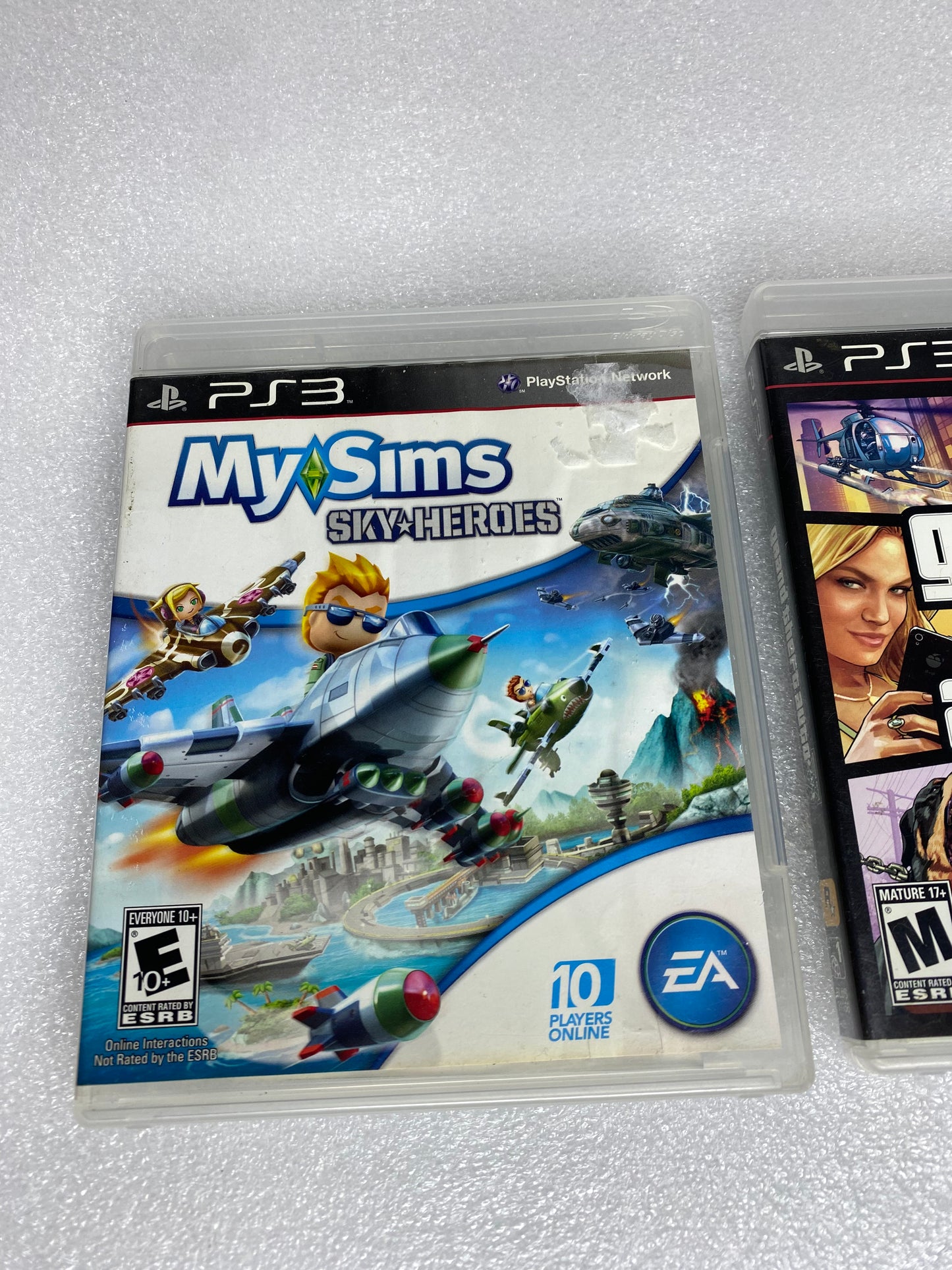 #58 - lot Of 2 -Sony PlayStation 3 Video Games GTA V, My Sims Sky Heroes- (READ) - (IN CONDITION AS SHOWN)
