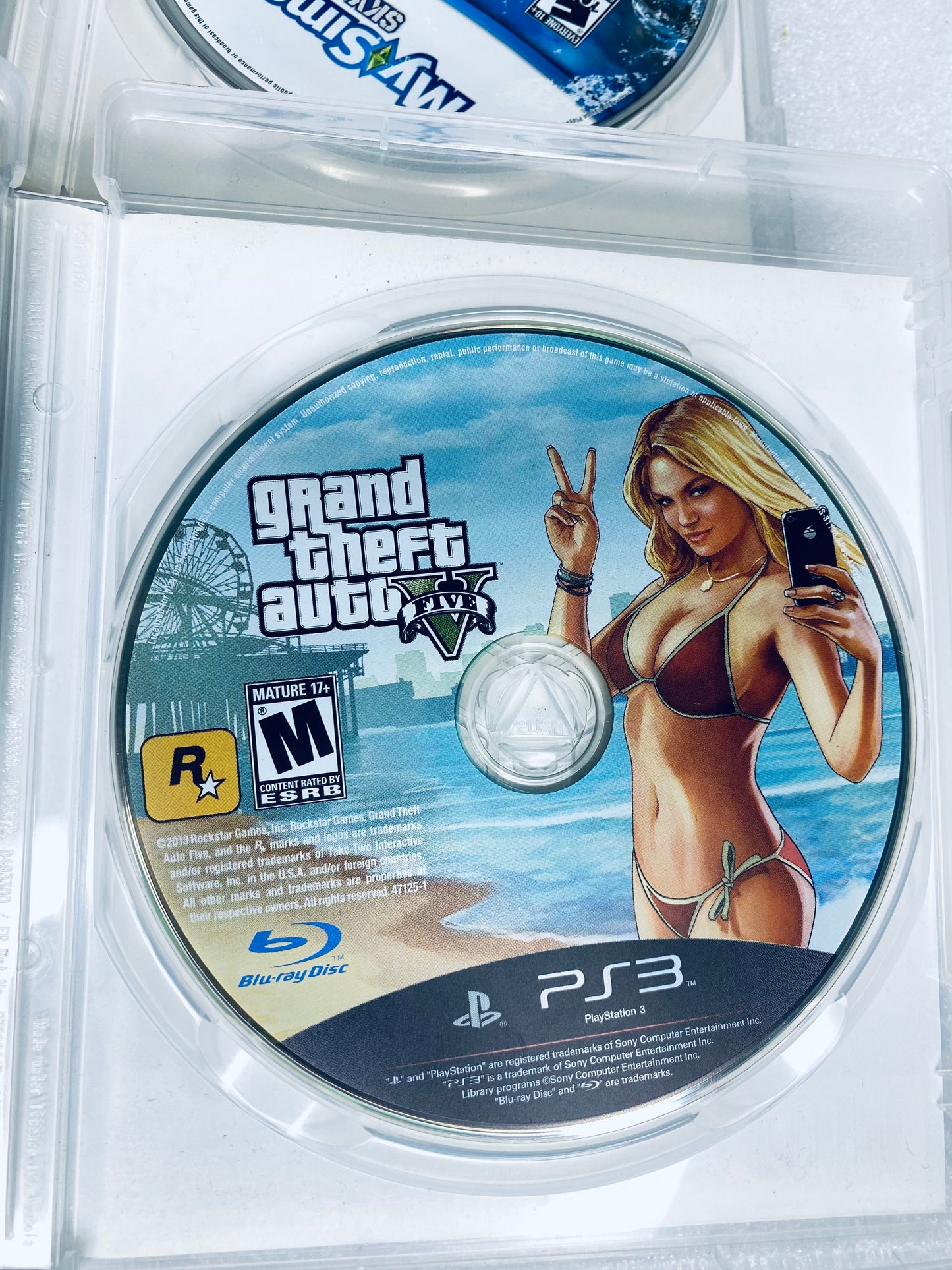 #58 - lot Of 2 -Sony PlayStation 3 Video Games GTA V, My Sims Sky Heroes- (READ) - (IN CONDITION AS SHOWN)