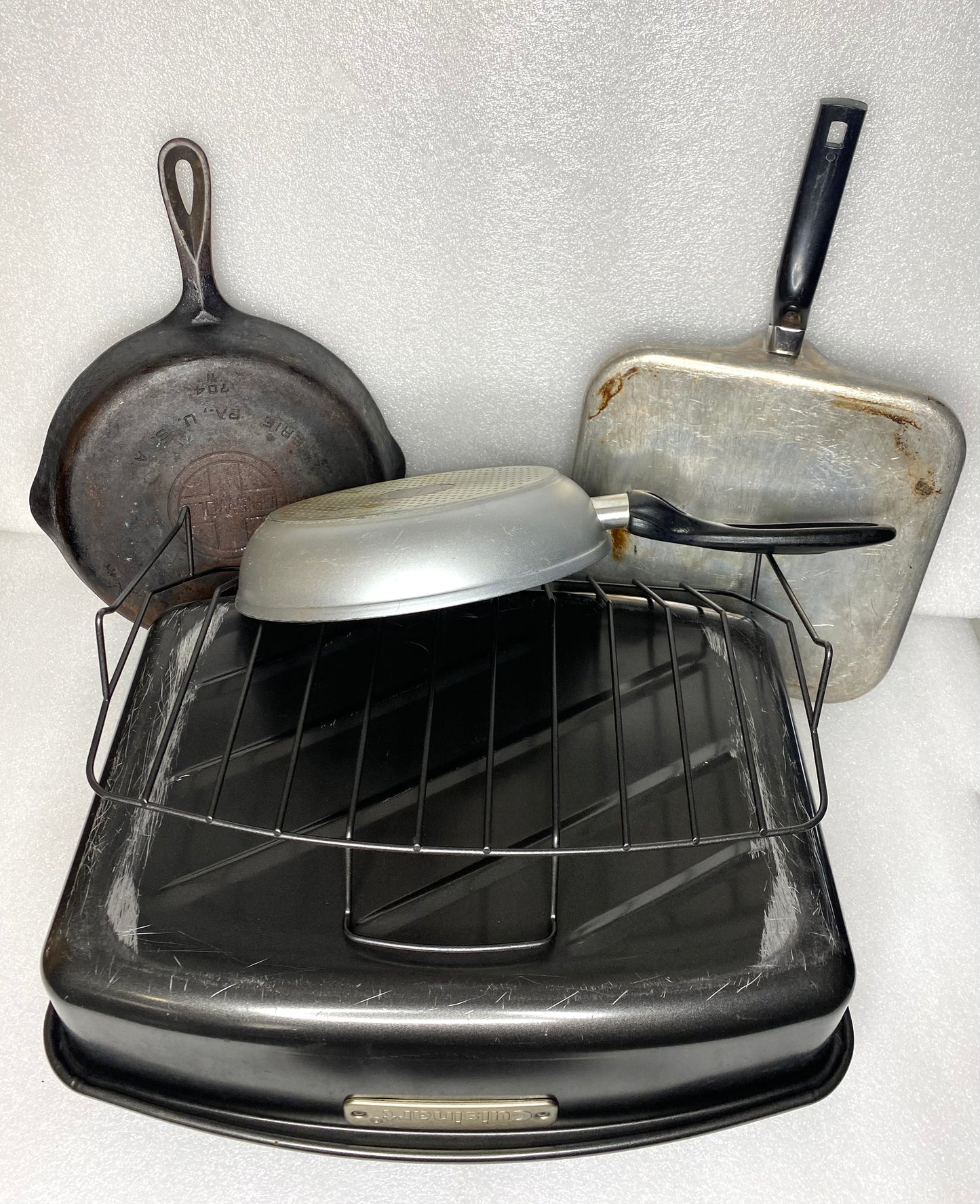 #84 - lot of 4 Kitchen Cookware Items Pans, Griddle, Roast Insert - (READ) - (IN CONDITION AS SHOWN)
